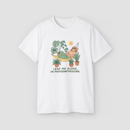 Leaf Me Alone, I'm Photosynthesizing' funny plant pun on a white oversized tee with a person in a hammock.\