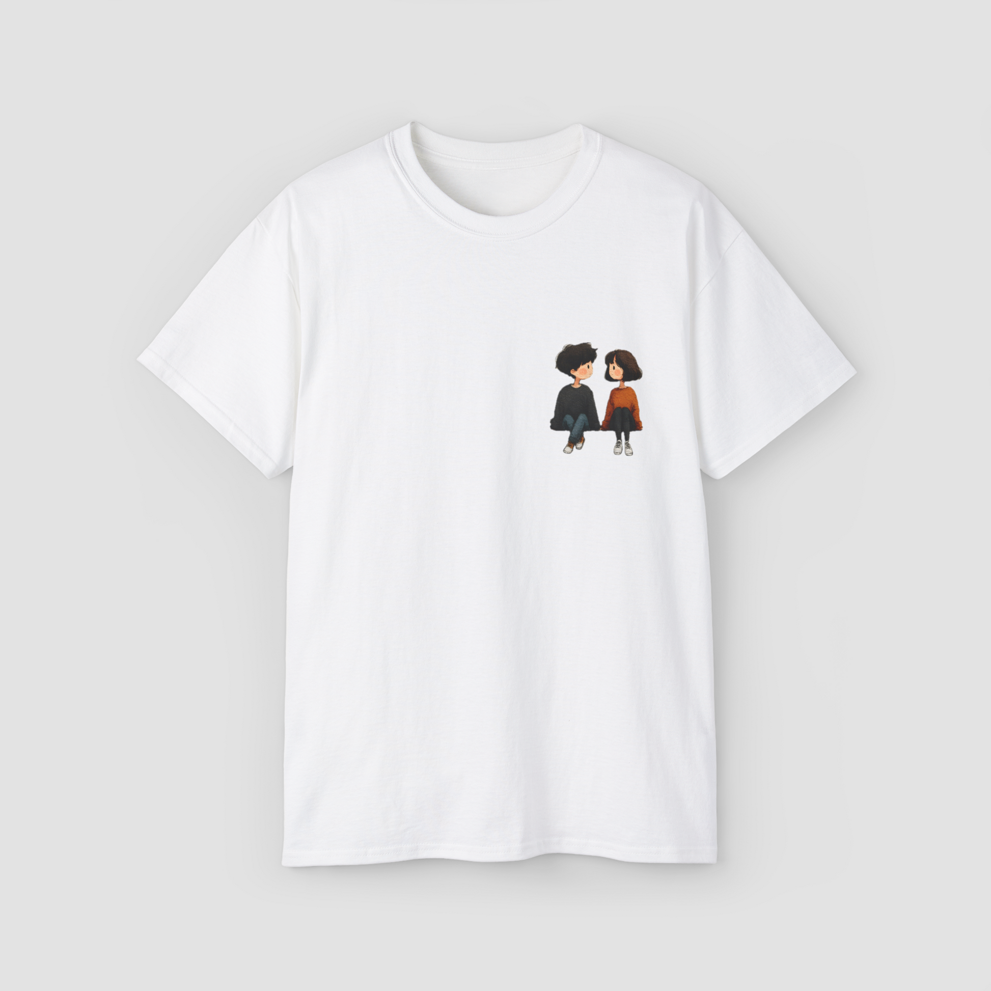A cute and colorful anime-style couple graphic on the 'You & I' white oversized terry cotton t-shirt.\