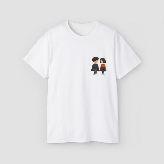 A cute and colorful anime-style couple graphic on the 'You & I' white oversized terry cotton t-shirt.\